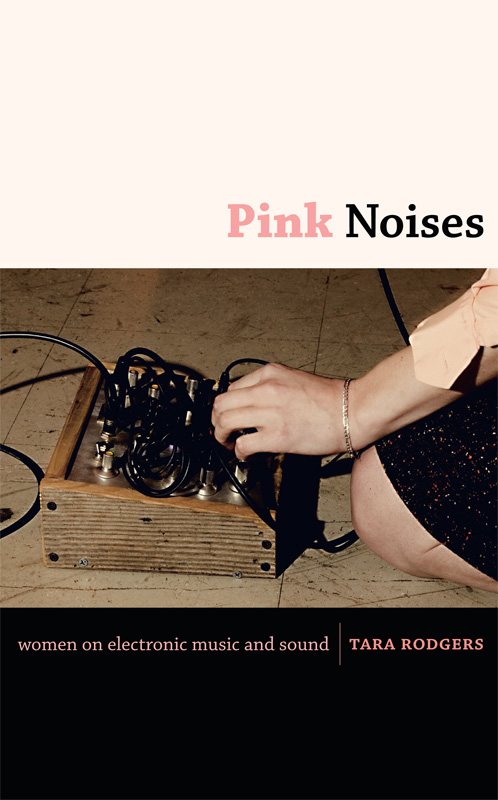 Pink Noises book cover showing the hand of Jessica Rylan playing a synth she designed.